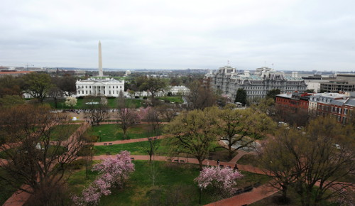 an aerial photo of the white house and washington monument.